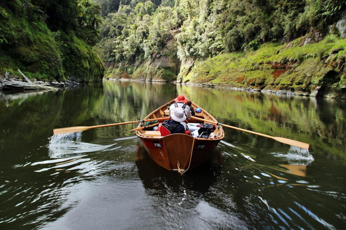 A wooden river dory on the Whanganui River